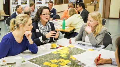 Image of Advisory group talking at table
