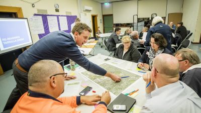 Image of advisory group talking at table