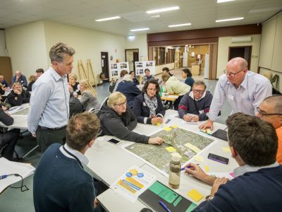 Tarralla Creek Community Advisory Group meeting with people sitting at tables