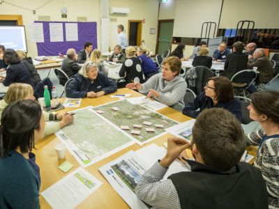 Tarralla Creek Community Advisory Committee sitting at tables 