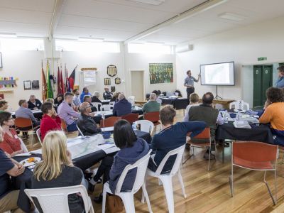 Community Advsisory Group members seated at tables